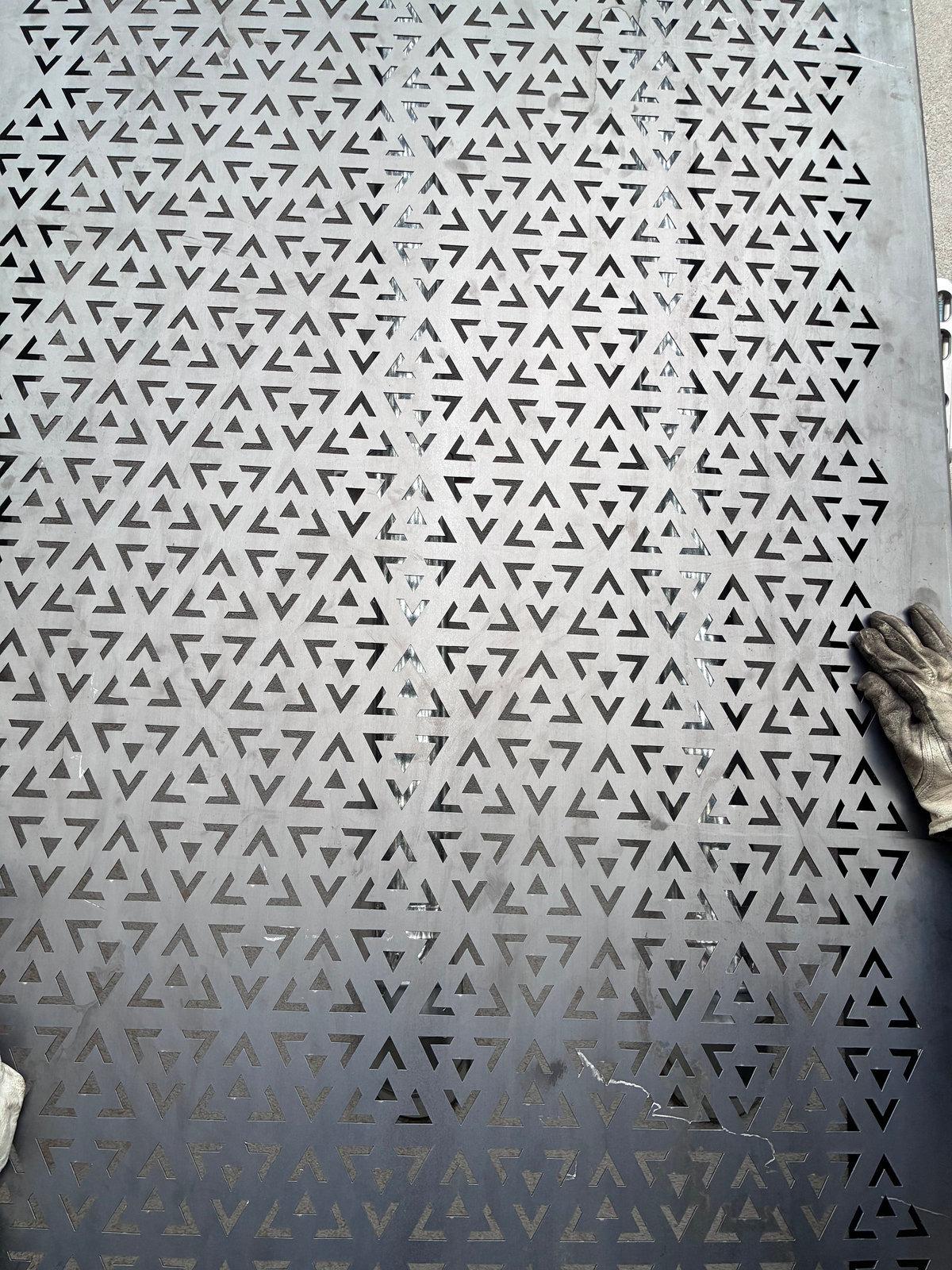 Perforated decorative metal panel