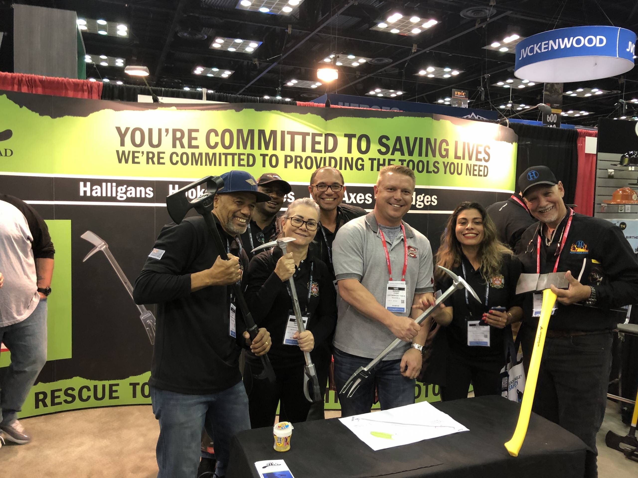 Employees holding tools