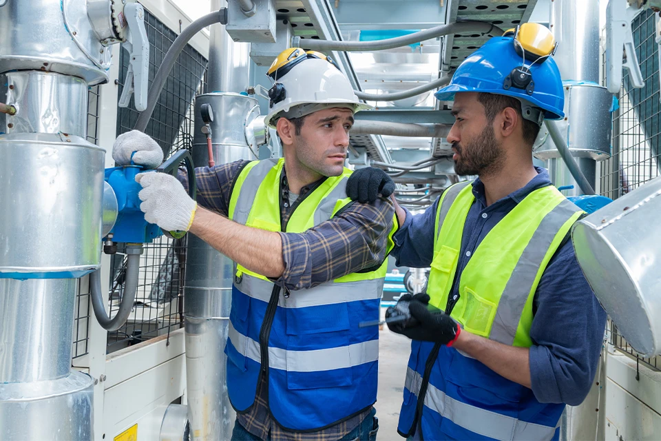 Two Construction Workers Talking