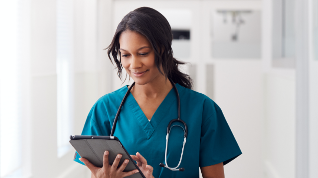 Doctor With Tablet